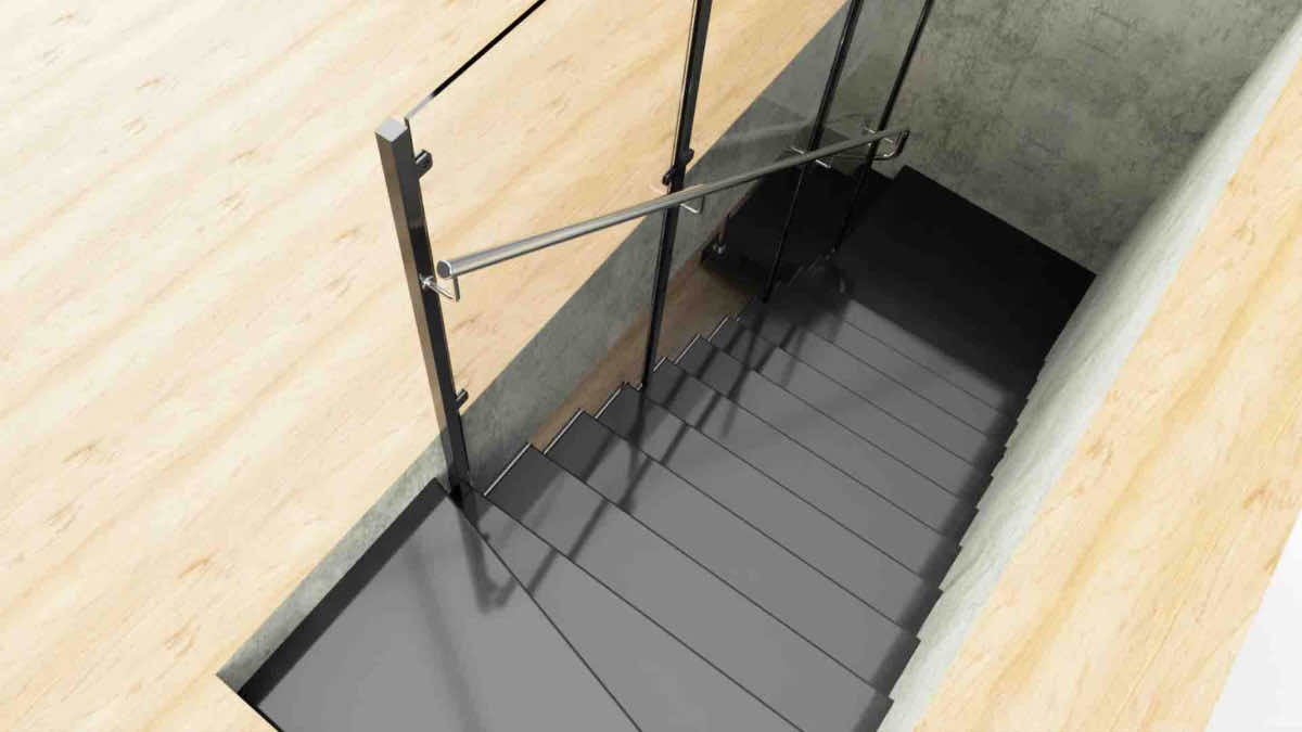 Render concettuale, vista dall'alto della rampa con corrimano in tubolare inox e lastre in vetro